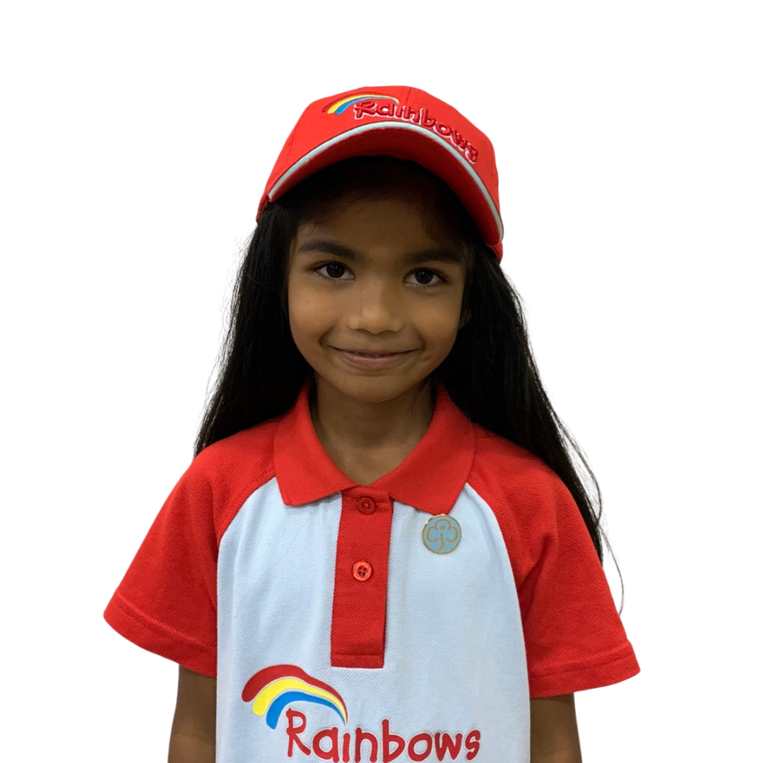 Rainbow wearing red baseball cap with Rainbows logo embroidered across the front.